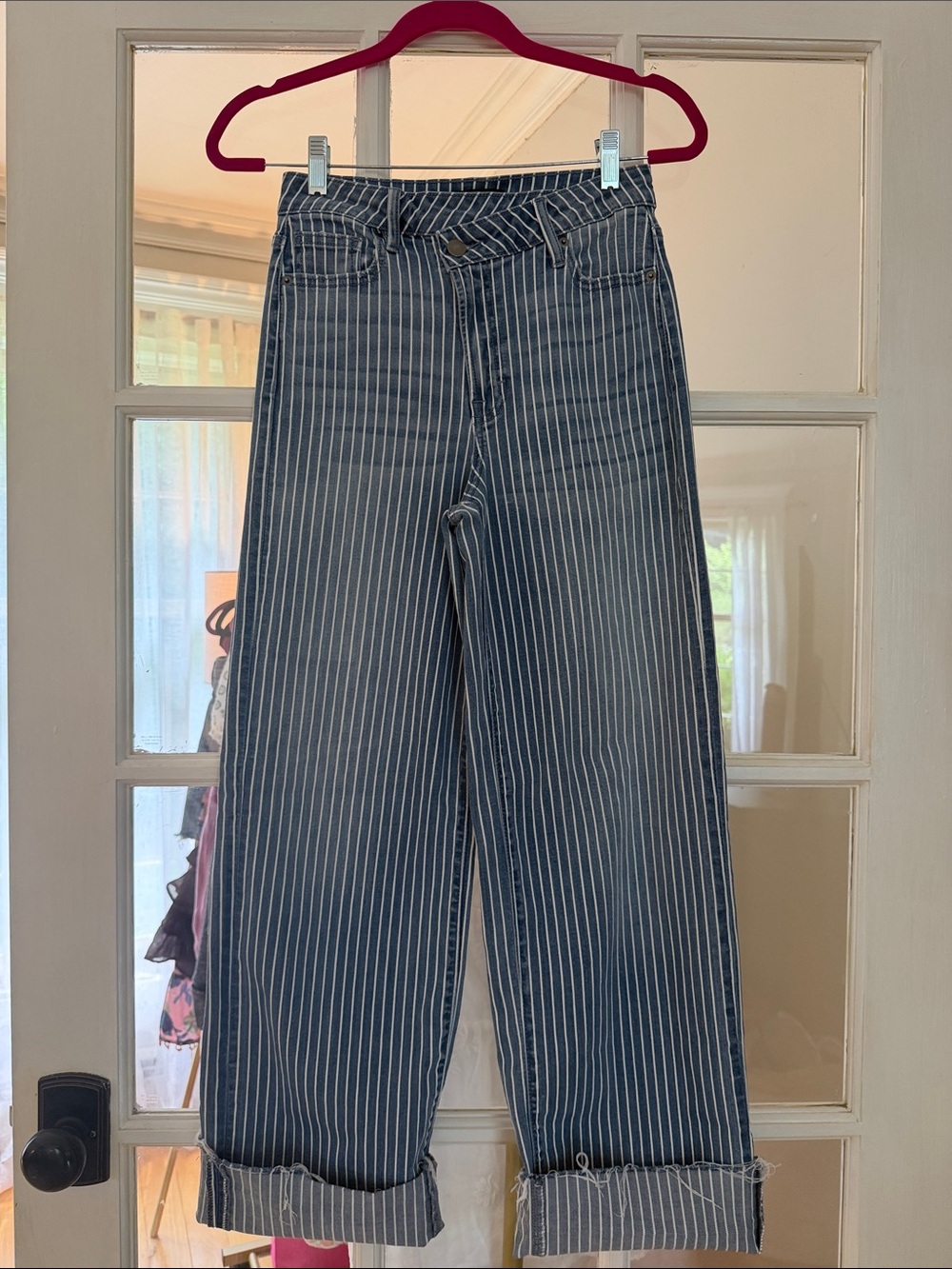 Aqua Blue and White Cuffed Pinstripe Wide-Leg Jeans
Size: 26
Retail: $98